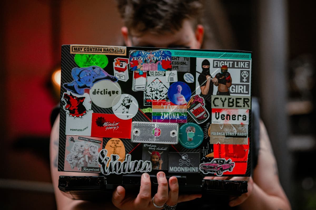 Vinyl stickers arranged on a laptop lid